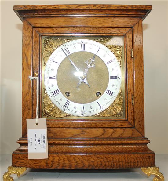 A late Victorian golden oak bracket clock, 13in.